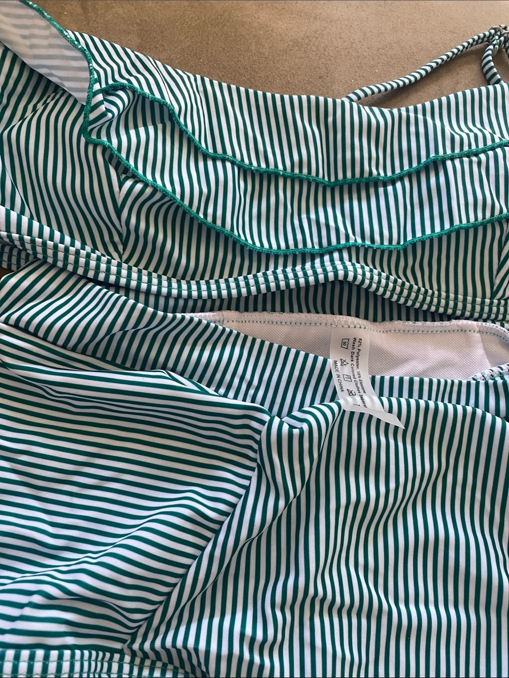 Green and white striped bikini size medium 
New without tags